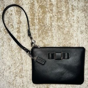 Small coach bow wristlet